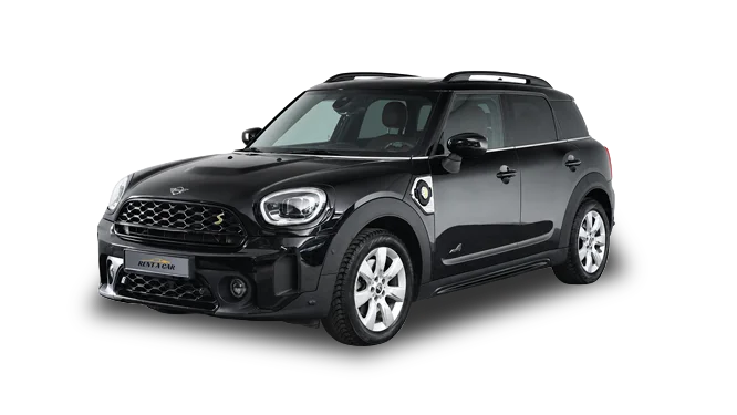 Mini_Countryman_home - Rent A Car Igoumenitsa Black Mini Cooper Countryman SUV seen from the front-left angle, with roof rails and four doors.